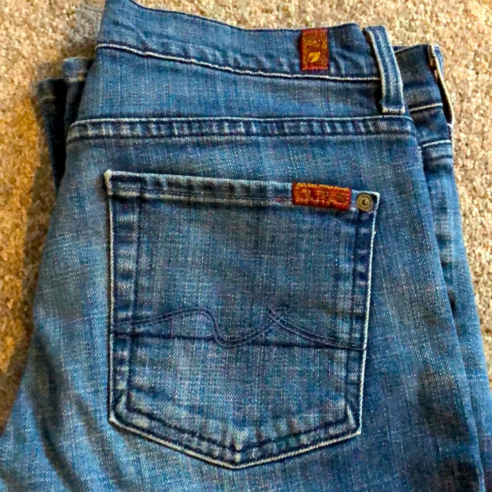 7 for all mankind. Blue “boy cut” jeans. Size 28